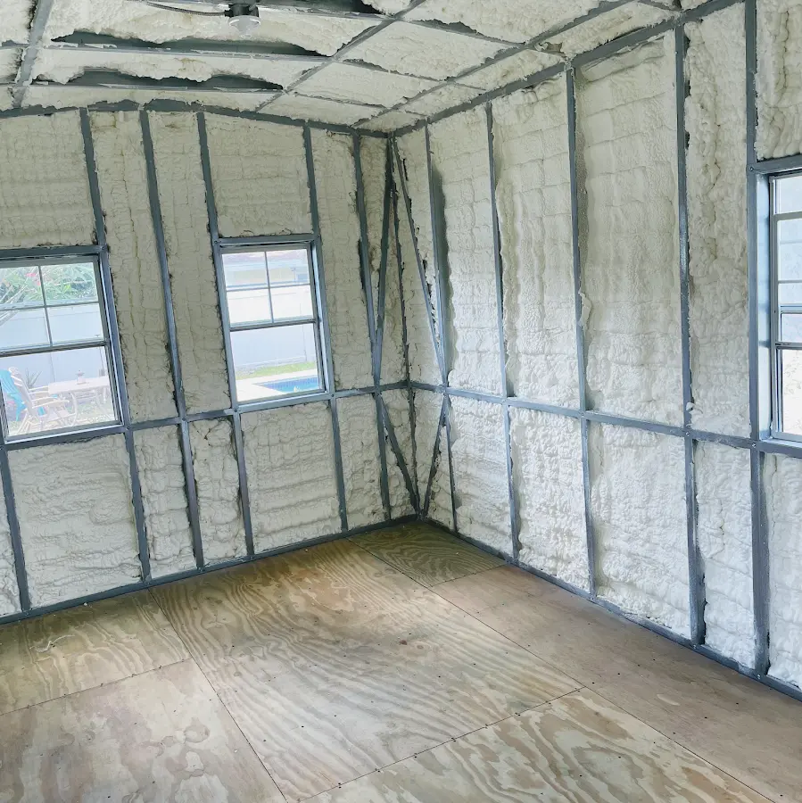 Closed-cell spray foam insulation applied to wall cavities in a residential project in Forest Park