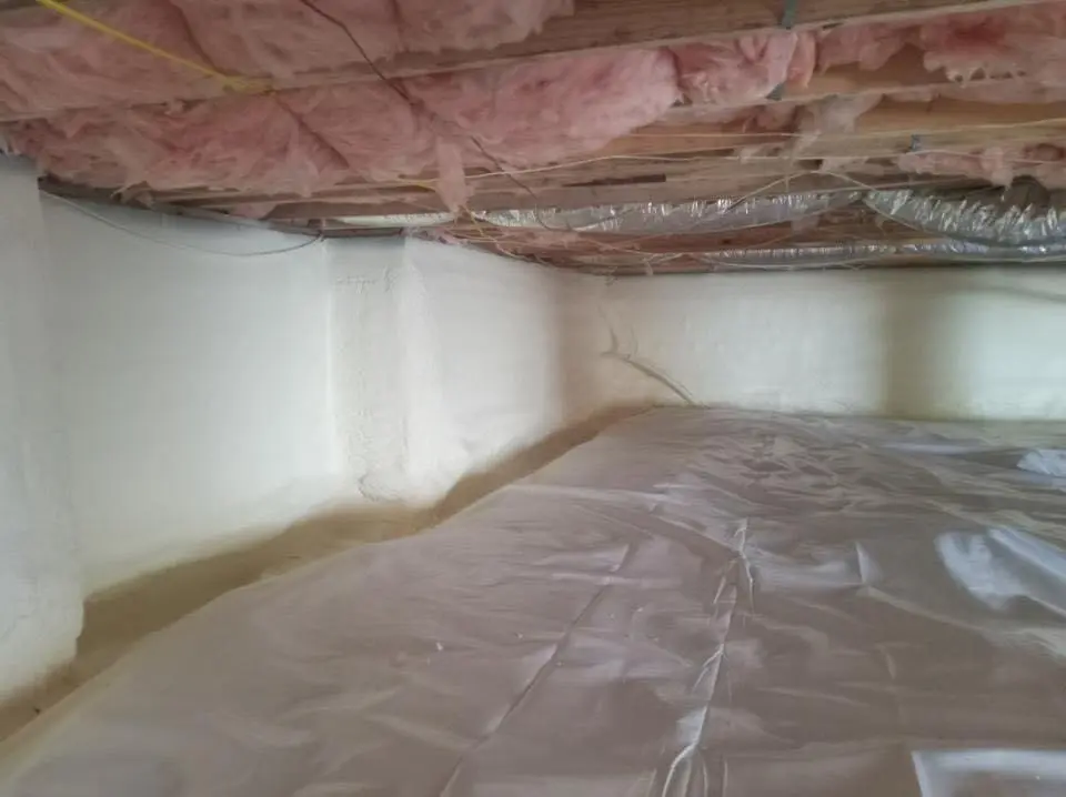 Crawl space encapsulation with closed-cell spray foam for Commercial Roof Restoration in Forest Park
